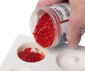 Glass frit being poured into a mold
